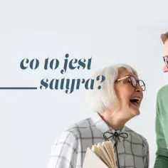 Dwie kobiety śmieją się, trzymając książki. Jedna z nich pyta: "Co to jest satyra?".