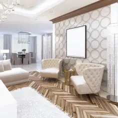 Eleganckie fotele i sofa w salonie z elementami secesji, ozdobna ściana z okręgami i kryształowa lampa.